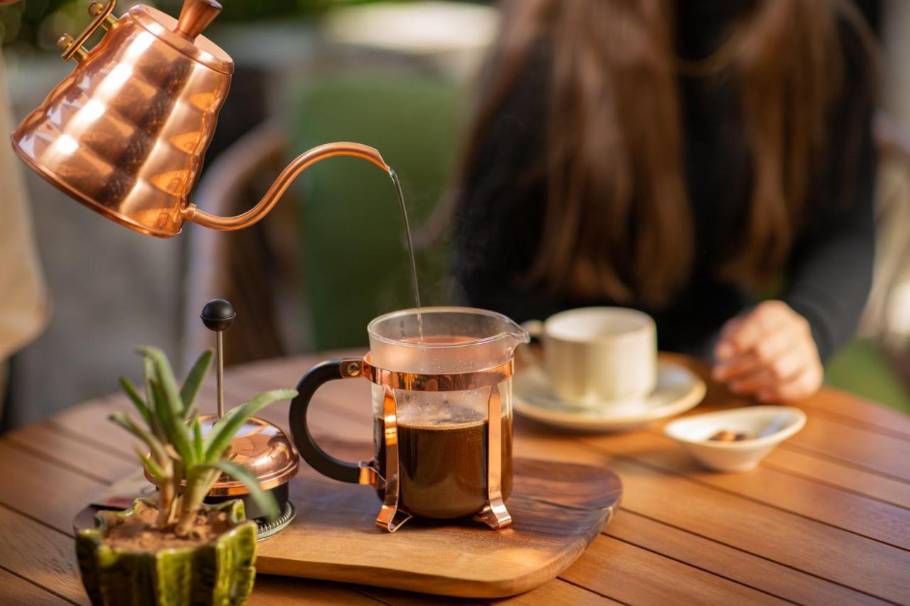 Hotel Jadali & Spa Марракеш Экстерьер фото A copper kettle and a glass cup