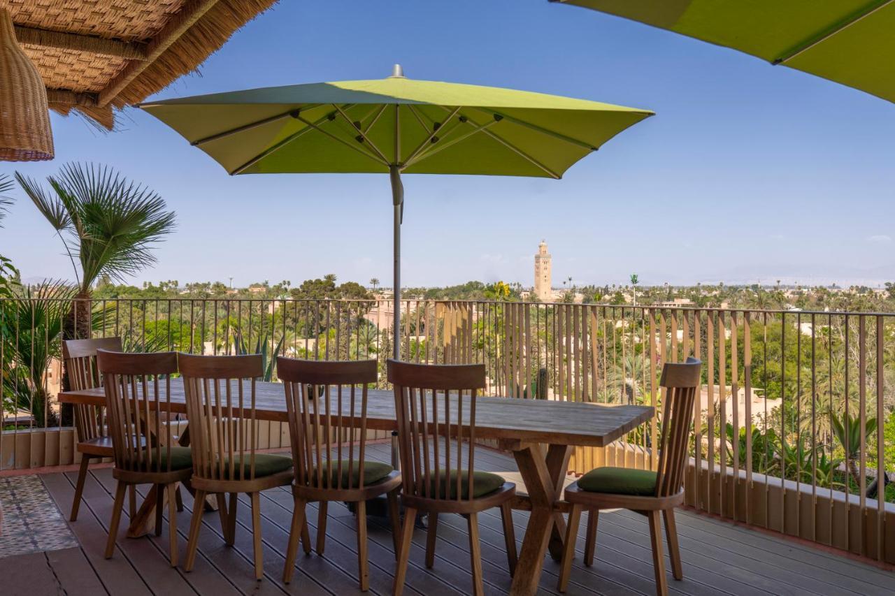 Hotel Jadali & Spa Марракеш Экстерьер фото A patio umbrella